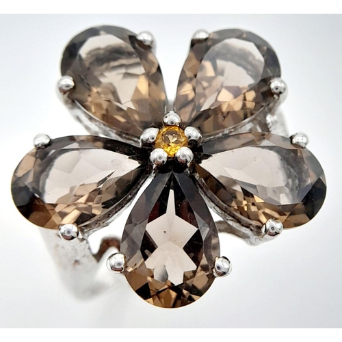 1064 - A Sterling Silver Pear Cut Smoky Quartz Flower Design Ring Size Q. The Crown Measures 2.2cm Diameter... 