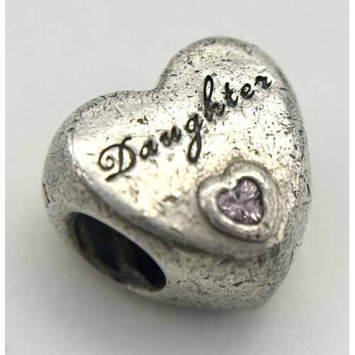 1086 - A PANDORA STERLING SILVER PINK STONE SET DAUGHTER HEART CHARM. 4G. Ref: SC 9014