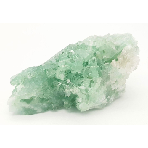 1171 - A 134.55ct Rough Green Hiddenite Spodumene, Afghanistan Origin. Comes with GFCO Certificate.