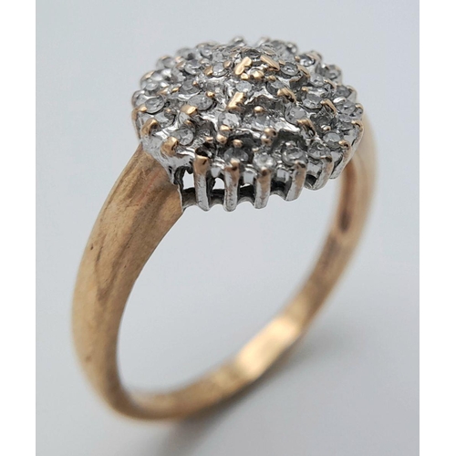 554 - A 9k yellow gold diamond cluster ring, 0.20ct diamond weight, 3.8g total weight, size P 1/2. Ref: 62... 