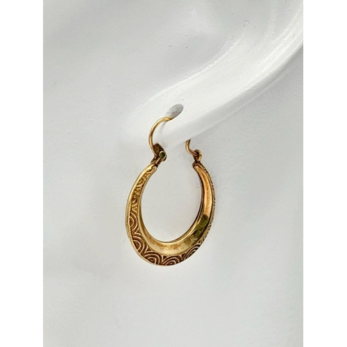 575 - A 9k yellow gold creole hoop earrings, 1.7g total weight , approx 26mm x 21mm. Ref: 8939H