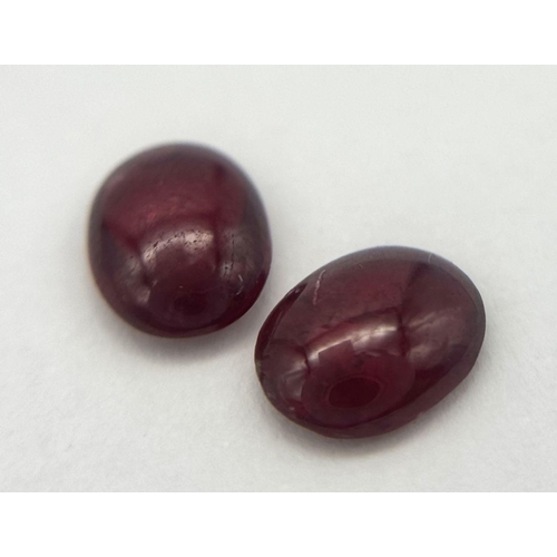 608 - A PAIR OF CABACHON OVAL RUBIES. 1.61CT. Ref: A/S NN 2