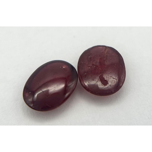 608 - A PAIR OF CABACHON OVAL RUBIES. 1.61CT. Ref: A/S NN 2