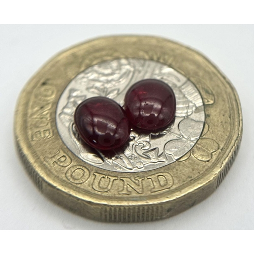 608 - A PAIR OF CABACHON OVAL RUBIES. 1.61CT. Ref: A/S NN 2