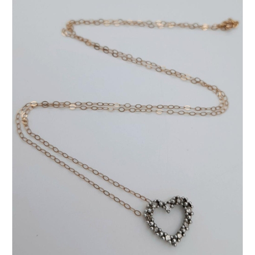 612 - A 9 Carat Yellow Gold Diamond Heart Pendant Necklace-46cm Length. Pendant Measures 1.2cm Width and i... 