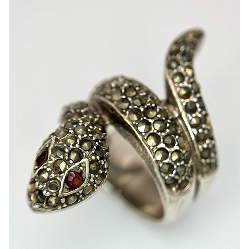 616 - Vintage SILVER MARCASITE SNAKE RING. Consisting a large coiled SILVER RING complete with red gemston... 