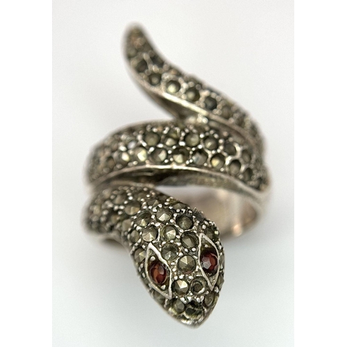 616 - Vintage SILVER MARCASITE SNAKE RING. Consisting a large coiled SILVER RING complete with red gemston... 