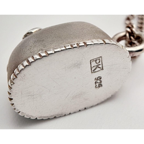 791 - A genuine Paul Kennedy SILVER BABY SLIPPER PENDANT mounted on a fine Italian SILVER CHAIN NECKLACE. ... 