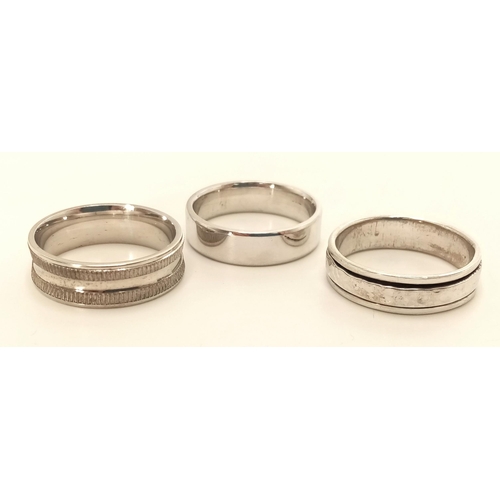 825 - A 3 X STERLING SILVER BAND RINGS, ONE IS A FIDGET RING WITH SPINNING CENTRE 18.6G , ALL SIZE V. Ref:... 