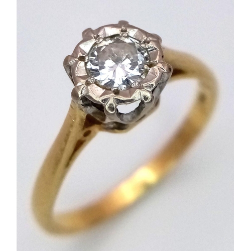 883 - An 18K Yellow Gold Diamond Solitaire Ring. Size N. A 0.30ct brilliant round cut diamond. 3g total we... 