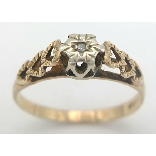 895 - A Vintage 9K Yellow Gold Diamond Ring. Solitary small diamond in a raised setting. Size M. 1.55g.