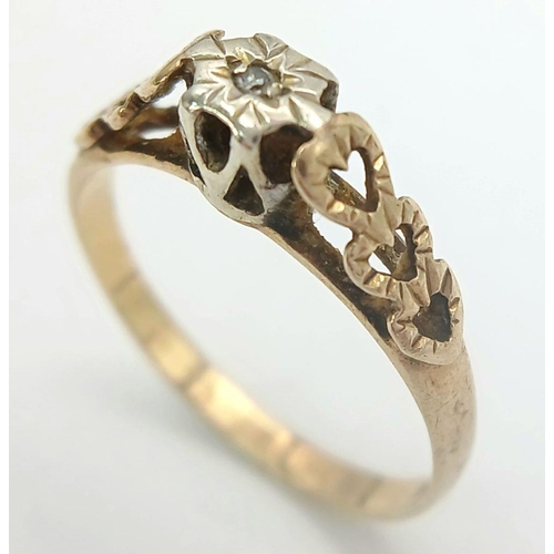 895 - A Vintage 9K Yellow Gold Diamond Ring. Solitary small diamond in a raised setting. Size M. 1.55g.