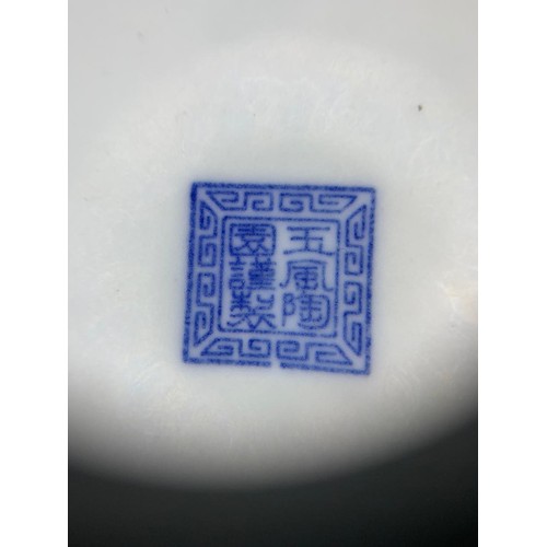 1517 - An antique Chinese blue and white ceramic octagonal dish with a dragon motif. Marking on base. 7cm d... 