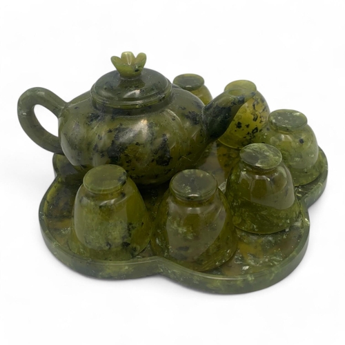 1604 - A fine antique Chinese Serpentine jade Teapot Set with Cups and Tray. Vibrant green with black natur... 