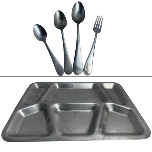 1765 - A Vietnam War era U.S. military mess kit including a six-compartment mess tray and a set of four sta... 