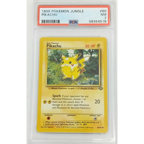 1167 - A 1999 Pokémon Jungle TCG card featuring Pikachu (Card #60). Authenticated and graded NM 7 by PSA wi... 