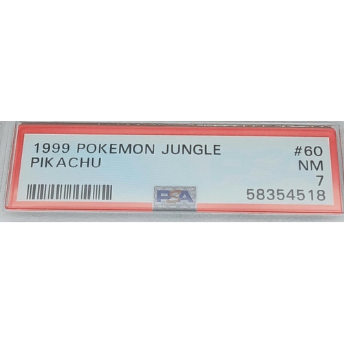 1167 - A 1999 Pokémon Jungle TCG card featuring Pikachu (Card #60). Authenticated and graded NM 7 by PSA wi... 