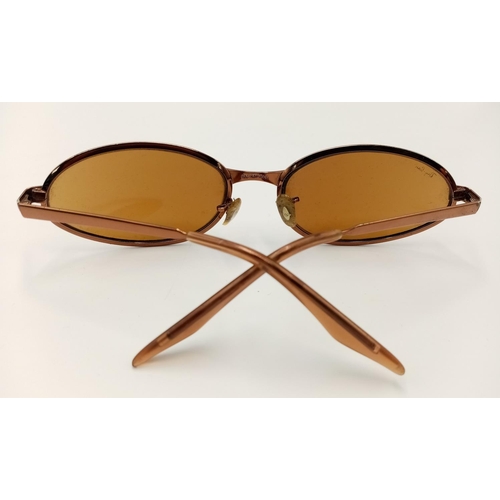 1179 - A Pair of Vintage Ladies Ray Bans Sunglasses. Come with an orginal case.