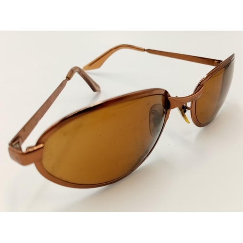 1179 - A Pair of Vintage Ladies Ray Bans Sunglasses. Come with an orginal case.