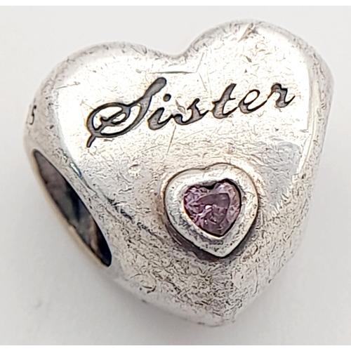 1219 - A PANDORA STERLING SILVER STONE SET SISTER HEART CHARM. 11mm x 11mm, 3.8G TOTAL WEIGHT. Ref: SC 9005