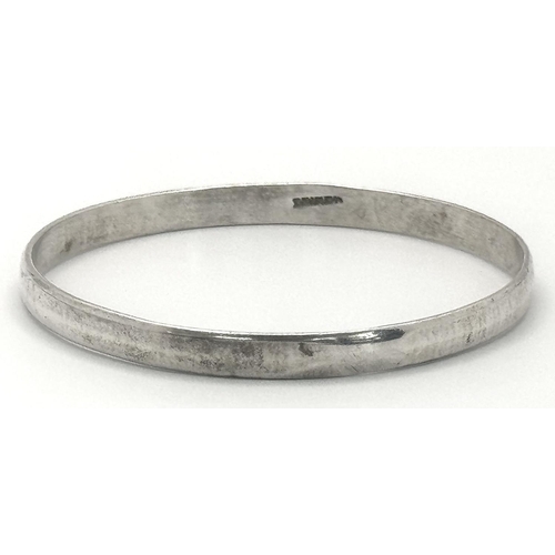 1243 - A fashion Mexican silver bangle. Total weight 14.9G. Diameter 7cm.