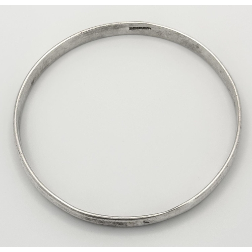 1243 - A fashion Mexican silver bangle. Total weight 14.9G. Diameter 7cm.