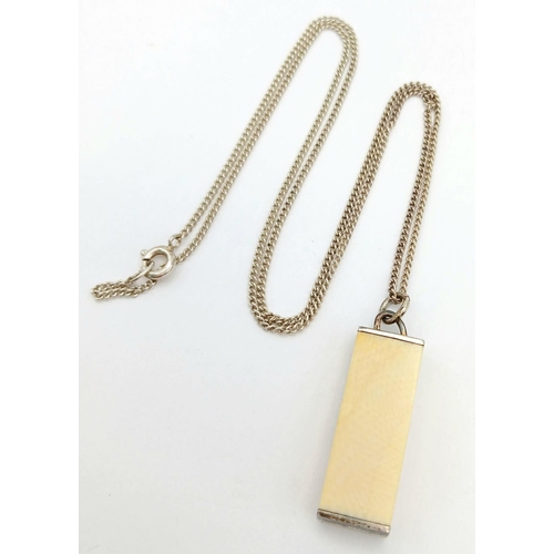 1250 - An antique 925 silver rectangular bone block pendant. Set on sterling silver chain. Total weight 7.6... 