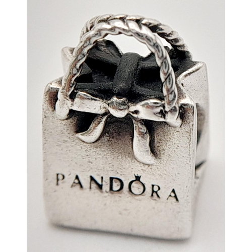 1371 - A PANDORA STERLING SILVER SHOPPING BAG CHARM 4.5G , 14MM X 10MM. Ref: SC 9024