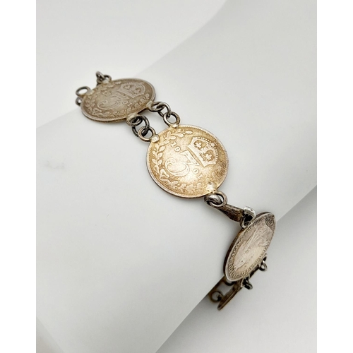 1405 - A  vintage Victoria 1899 coin link bracelet. Total length 19cm. Please see photos for details.