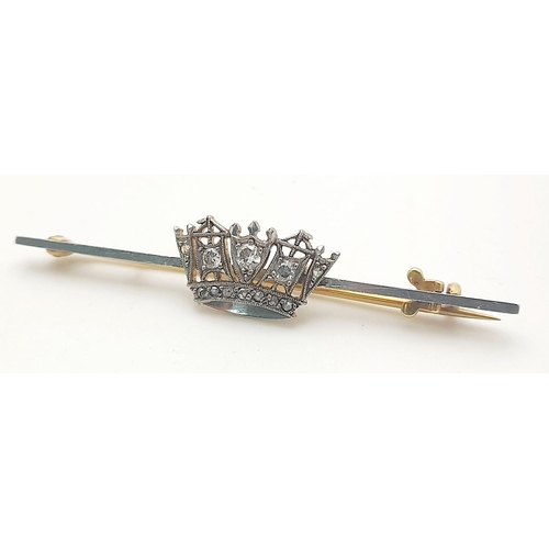 408 - An Antique Art Deco 15k Yellow Gold, Platinum and Diamond Regal Stick Pin. A central diamond crown -... 