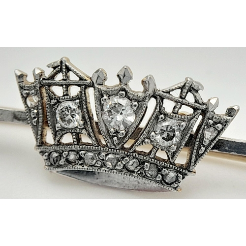 408 - An Antique Art Deco 15k Yellow Gold, Platinum and Diamond Regal Stick Pin. A central diamond crown -... 