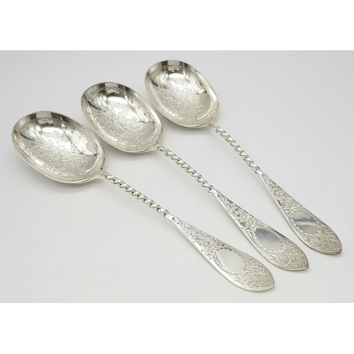 597 - A SUPERB SET OF 3 RUSSIAN ANTIQUE SERVING SPOONS. MARKED 84, BRIGHT CUT WITH WONDERFULL INCISED FLOR... 