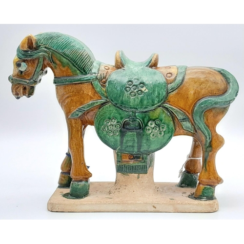 604 - A SUPERB LATE MING DYNASTY POTTERY HORSE ON BASE. ORIGNALLY PURCHASED FROM SOTHERBYS IN 2005. STILL ... 