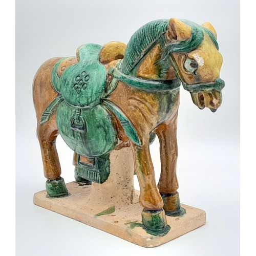 604 - A SUPERB LATE MING DYNASTY POTTERY HORSE ON BASE. ORIGNALLY PURCHASED FROM SOTHERBYS IN 2005. STILL ... 