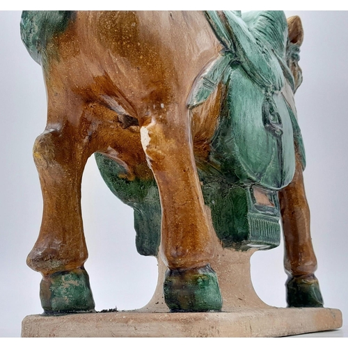 604 - A SUPERB LATE MING DYNASTY POTTERY HORSE ON BASE. ORIGNALLY PURCHASED FROM SOTHERBYS IN 2005. STILL ... 