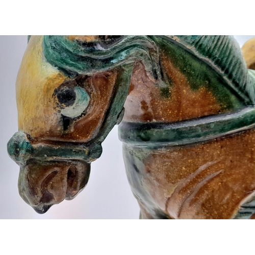 604 - A SUPERB LATE MING DYNASTY POTTERY HORSE ON BASE. ORIGNALLY PURCHASED FROM SOTHERBYS IN 2005. STILL ... 