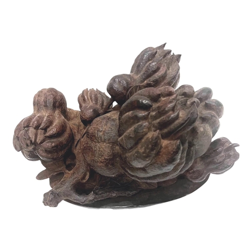 1898 - A Buddha's Hand Fruit Sculpture in Rosewood. Deep reddish-brown rosewood with detailed hand-carved r... 