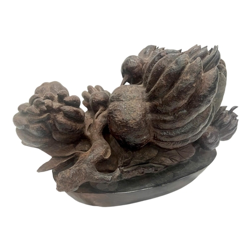 1898 - A Buddha's Hand Fruit Sculpture in Rosewood. Deep reddish-brown rosewood with detailed hand-carved r... 