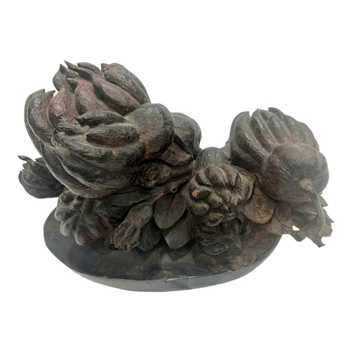 1898 - A Buddha's Hand Fruit Sculpture in Rosewood. Deep reddish-brown rosewood with detailed hand-carved r... 