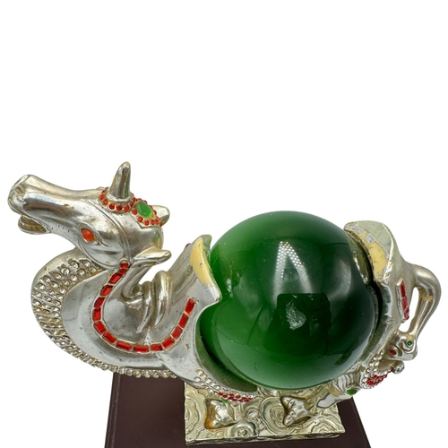 1353 - A fantastic collector's piece: natural Cat's Eye Stones set in a Feng Shui Camel Symbol. Expertly cr... 