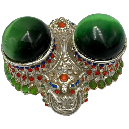 1353 - A fantastic collector's piece: natural Cat's Eye Stones set in a Feng Shui Camel Symbol. Expertly cr... 