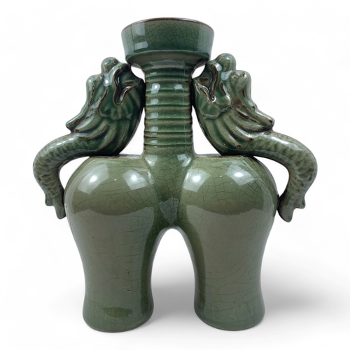 1240 - A Chinese Antique Celadon Double-Dragon Ceramic Vase.
Lovely green celadon featuring a crackle finis... 