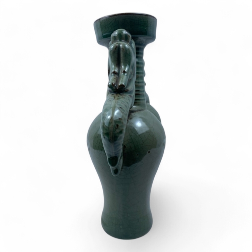 1240 - A Chinese Antique Celadon Double-Dragon Ceramic Vase.
Lovely green celadon featuring a crackle finis... 