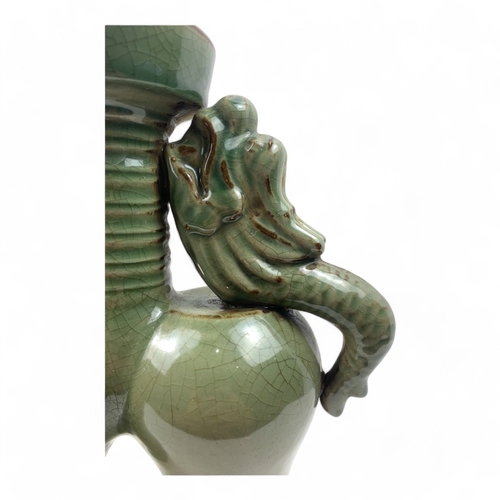 1240 - A Chinese Antique Celadon Double-Dragon Ceramic Vase.
Lovely green celadon featuring a crackle finis... 