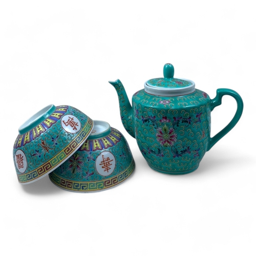 1325 - A Chinese Jingdezhen Turquoise Porcelain Tea Set. Turquoise and multicolored hand-painted floral and... 