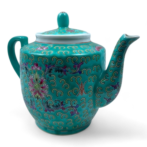 1325 - A Chinese Jingdezhen Turquoise Porcelain Tea Set. Turquoise and multicolored hand-painted floral and... 