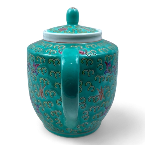 1325 - A Chinese Jingdezhen Turquoise Porcelain Tea Set. Turquoise and multicolored hand-painted floral and... 