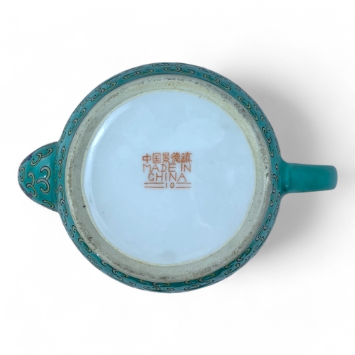 1325 - A Chinese Jingdezhen Turquoise Porcelain Tea Set. Turquoise and multicolored hand-painted floral and... 