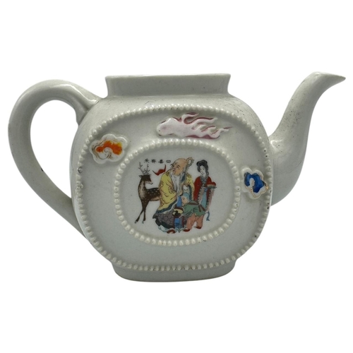 1373 - A Chinese export Porcelain Teapot with Hand-Painted Details. White porcelain exterior with multicolo... 