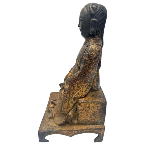 1401 - An antique Chinese large Bronze Seated deity Sculpture. 
Bronze exterior with aged patina and carved... 